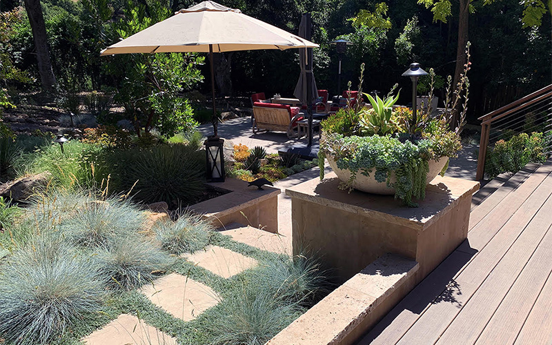 landscaped pathway to outdoor dining area