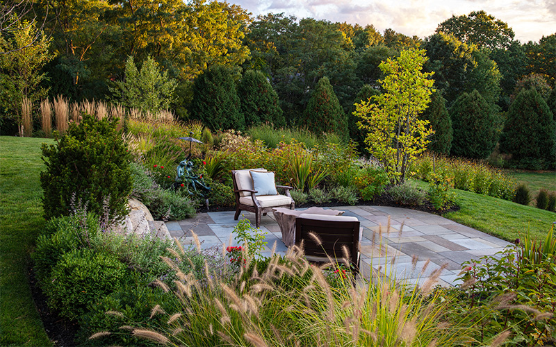 sunset at landscaped outdoor seating area